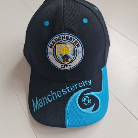 Ny Manchester City caps (justerbar size barn/voksen)