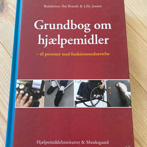 Grundbog om hjælpemidler.