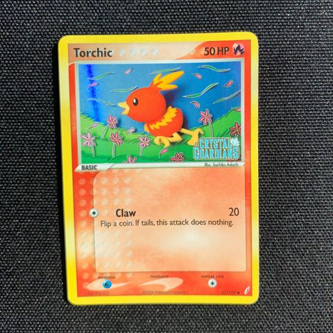 Torchic (Reverse Holo) Stamped - Crystal Guardians