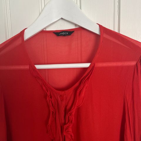 Oransje chiffon bluse fra KappAhl selges