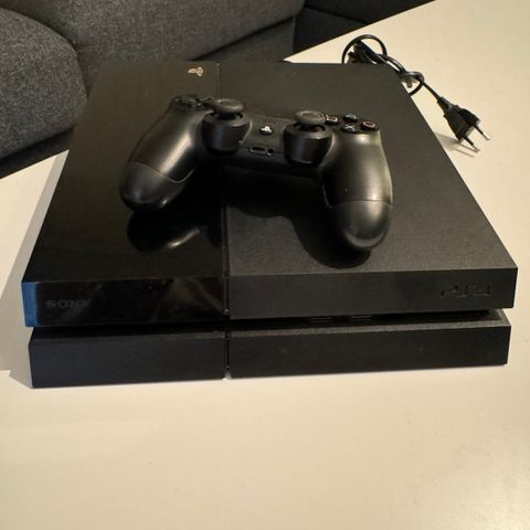 PlayStation 4 500gb med 8 spill