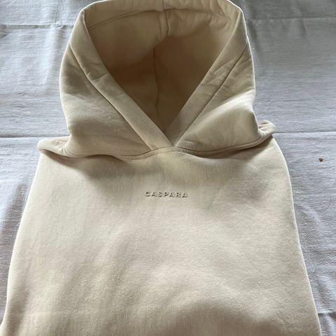 Caspara hoodie selges