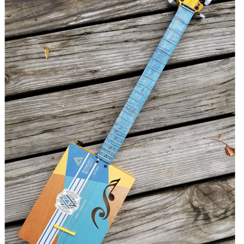 ØNSKES KJØPT: Cigar box guitar / sigarboks gitar eller lignende