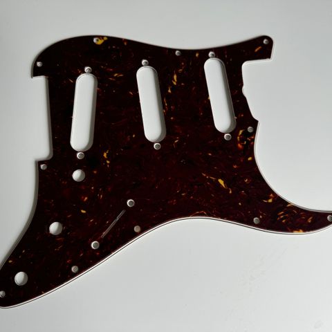 Strat deler: Fender Stratocaster plekterbrett