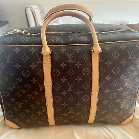 Praktisk Louis Vuitton reiseveske/bag.