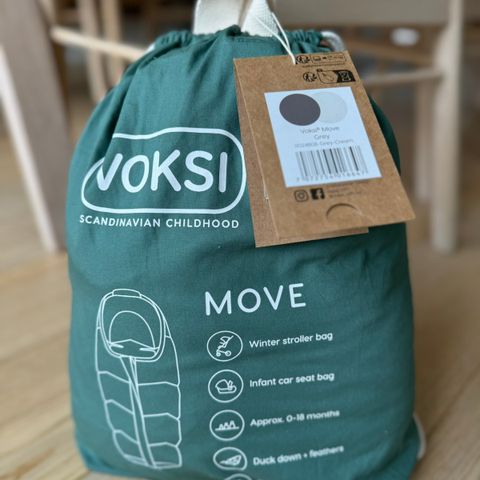 Voksi move (bilstolpose)