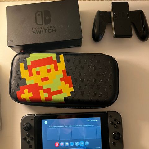 Nintendo Switch med spill og tilbehør