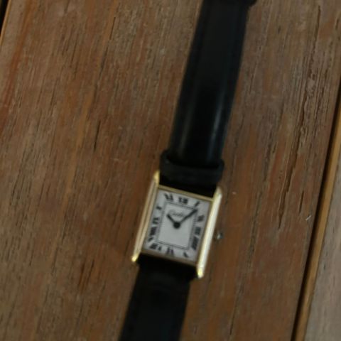 Cartier Tank selges