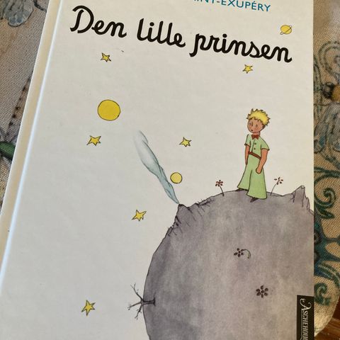 Den lille prinsen.  Antoine De Saint-Exupeey    Som ny