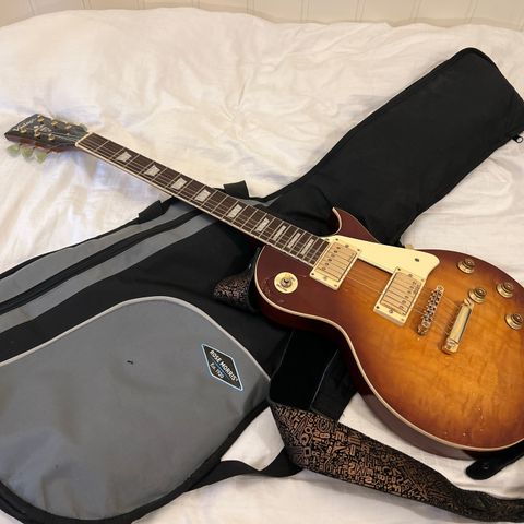 Vintage guitars V100 Flamed Ice Tea (Les Paul replika)