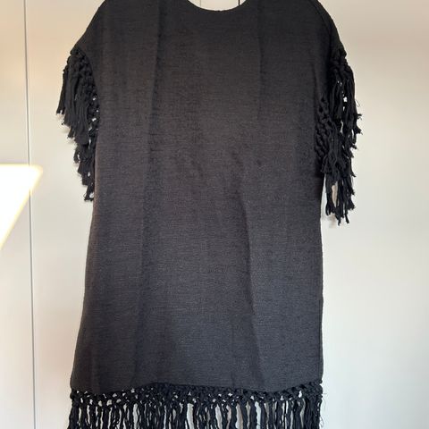 Vintage black cotton womens dress, with tassles. Size medium.