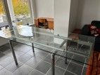 Uttrekkbart spisebord i glass