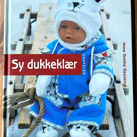 Sy dukkeklær