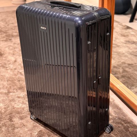 Rimowa i god stand - Large