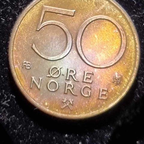 50 øre 1976 med regnbuepatina