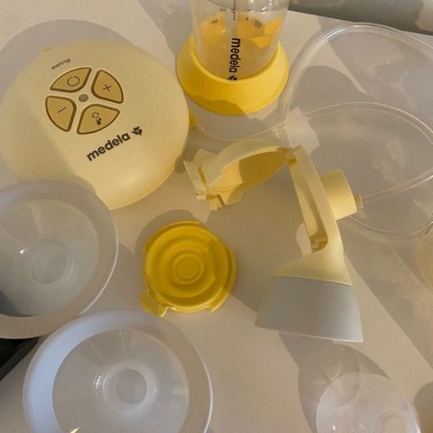 Medela swing flex brystpumpe med 2 flasker