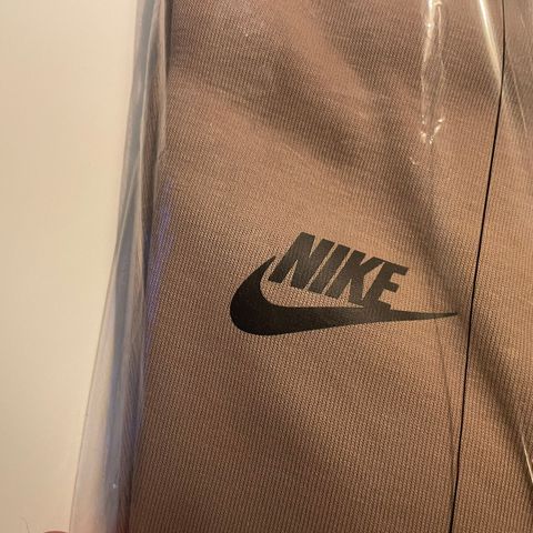 nike slim fit taper leg regular length Beige