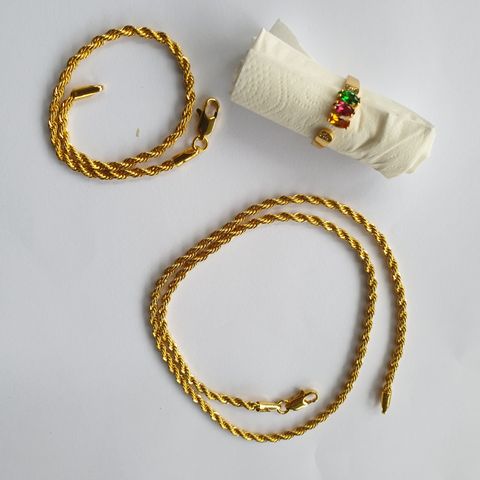 Bracelet, necklace and ring.