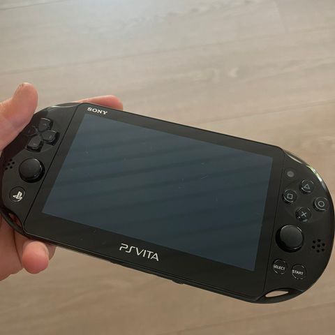 PS VITA med ett spill