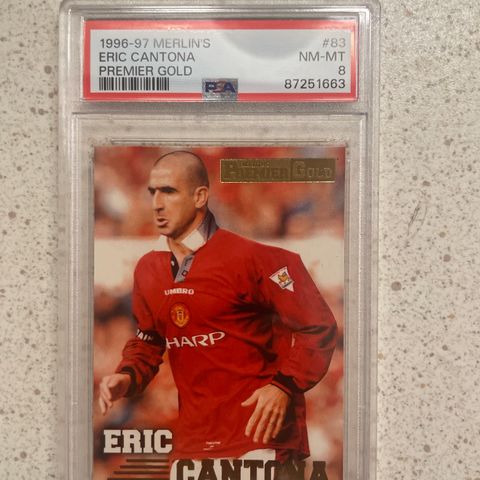 Eric Cantona - PSA 8 Premier Gold Merlins 96-97