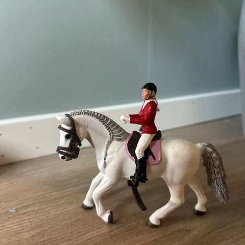 Schleich dressurhest med rytter