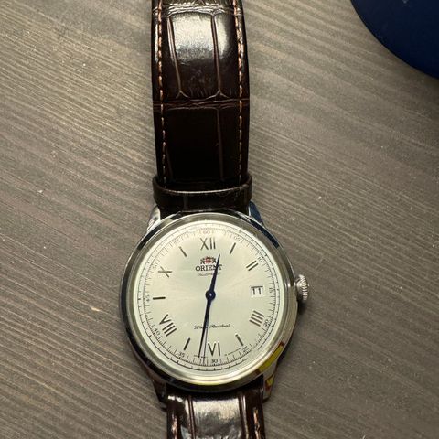 Orient bambino herreklokke