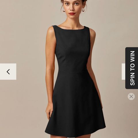 The Black Boat Neck High Waisted Mini Dress