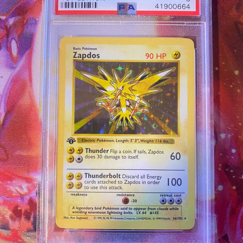 Base set zapdos 1st edition psa 8