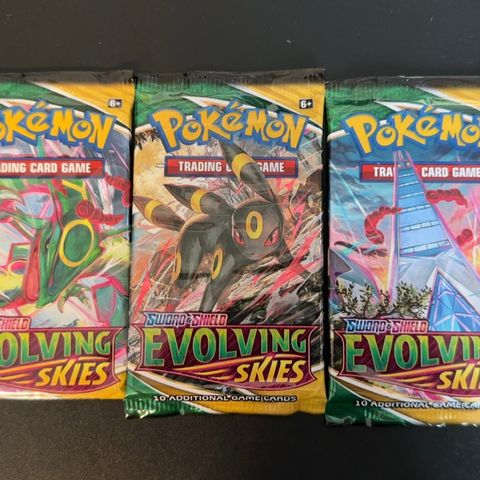 Evolving skies booster packs til salgs