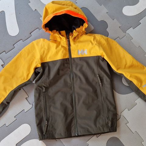 Nesten ubrukt Helly Hansen Shelter Jacket 2.0, skalljakke barn. Str. 122/7år