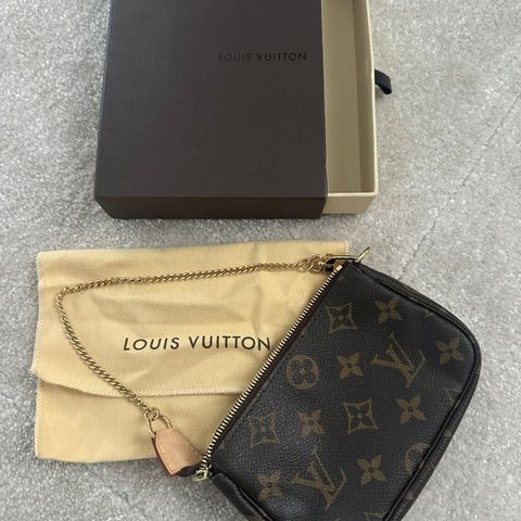 Louis Vuitton Pochette mini - som ny