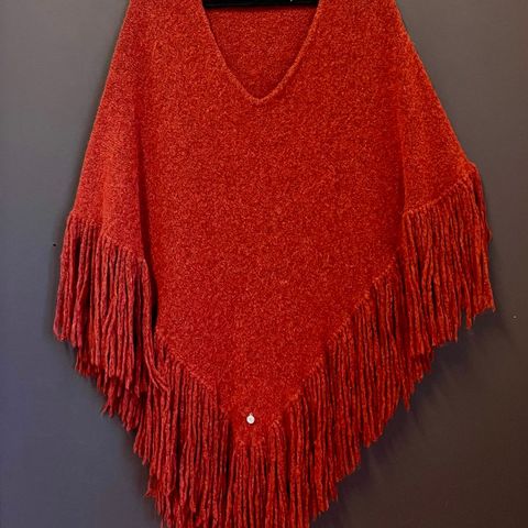 Oransje poncho fra Dehn Design