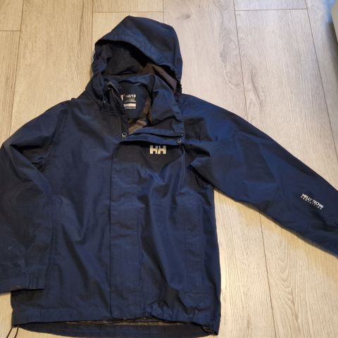 Helly hansen regnbuksa( ny med lappen på) og regnjakka str 140