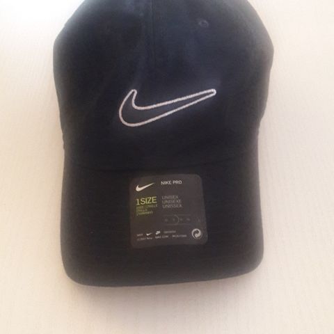 Nike svart golf caps. Ny.