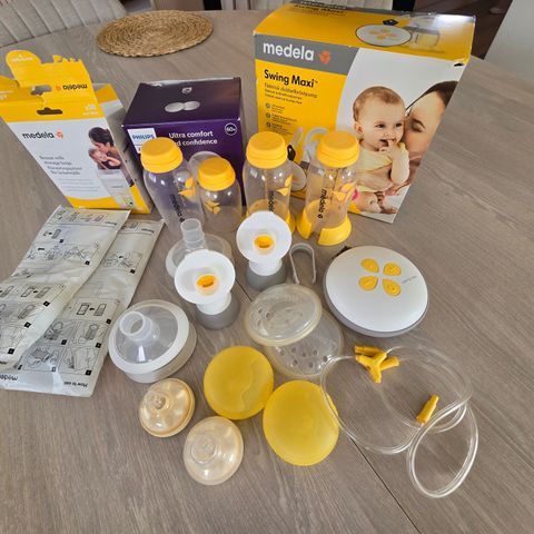 Medela Swing Maxi dobbel elektrisk brystpumpe med ekstra utstyr