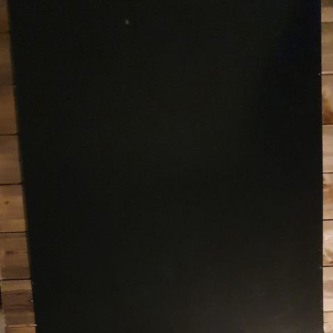 Gulvplate til vedovn i stål, buet.
100.5x80 cm.