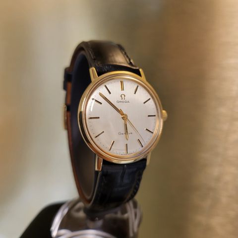 Omega Genève massiv gull