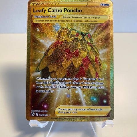 gold leafy camo poncho pokemon card 214/195- Silver Tempest - Full Art Evolves from null Rules Whenever your opponent plays a Supporter card from their hand leafy camo poncho 214/195