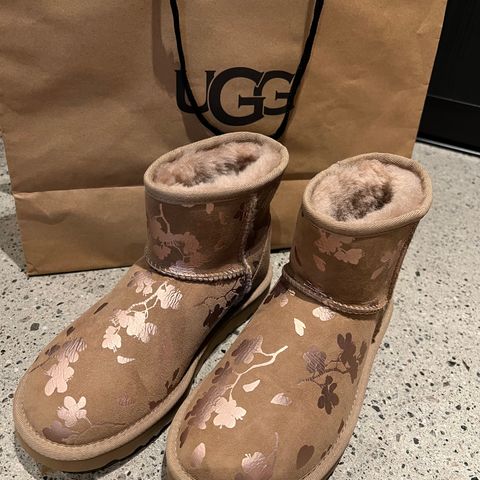 ugg boots with ugg written all over it