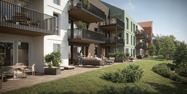 Meget pent opparbeidet felles hageanlegg mellom bebyggelsen og elvepromenaden