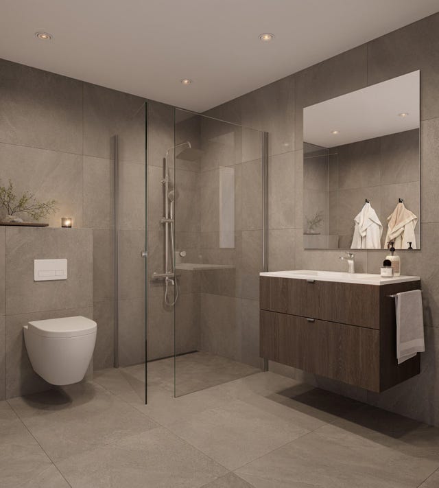 Delikate bad/wc med storformat fliser og solid innredning | vegghengt wc