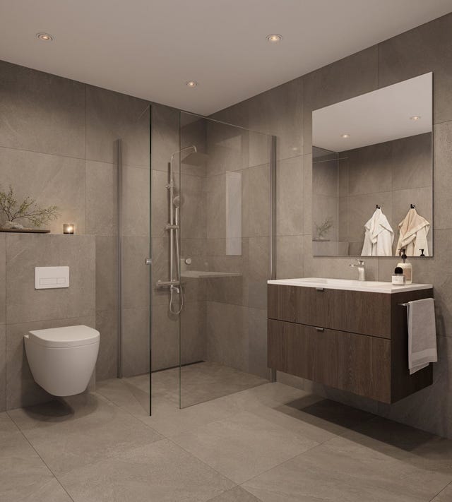 Elegant bad/wc med storformat fliser og Sigdal baderomsinnredning