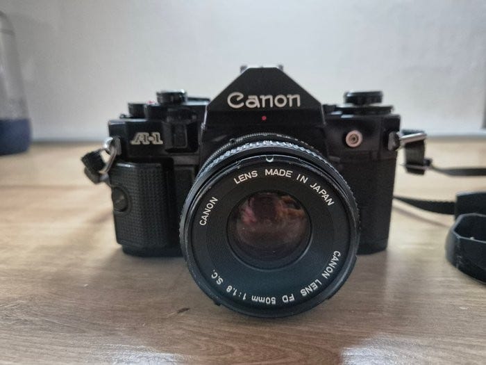Canon A-1 black + Data Back A + FD 1,8/50mm S.C. + acc