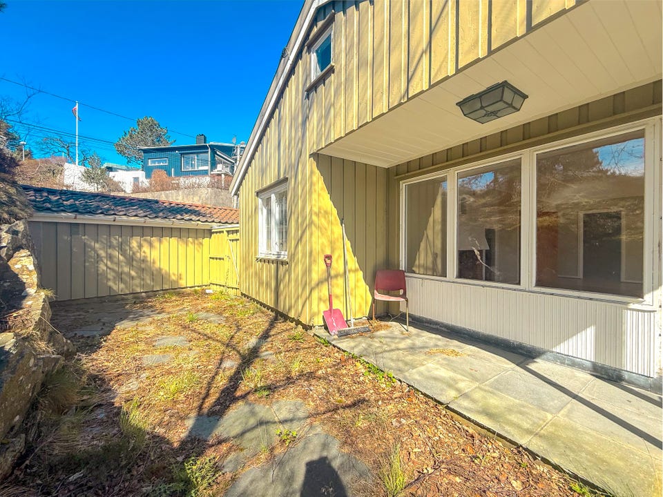 Sunny outdoor area with lots of potential.