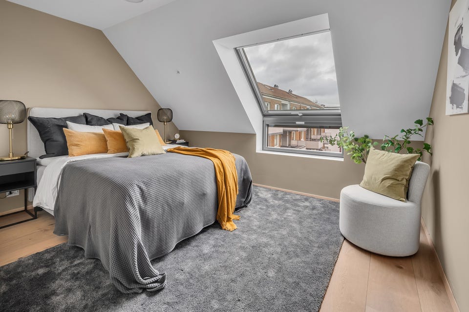 The bedroom is lovely, with a large roof window.
