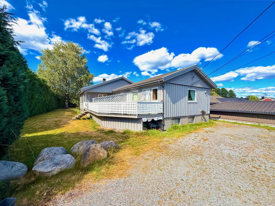The property has a generous plot with good parking and a garden around the home