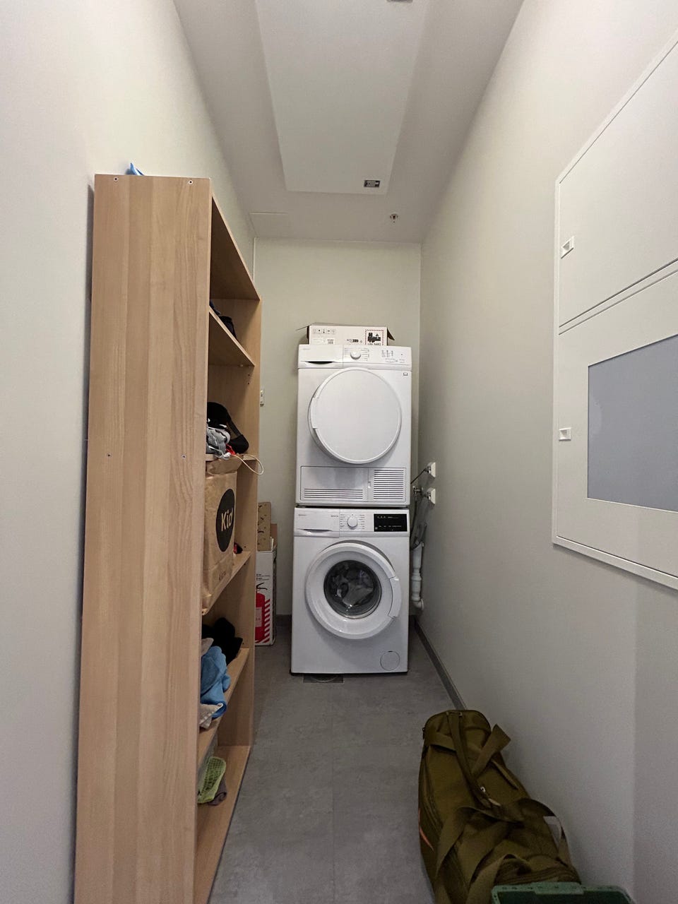 Practical laundry room. Washing machine, tumble dryer and shelf are included in the tenancy.