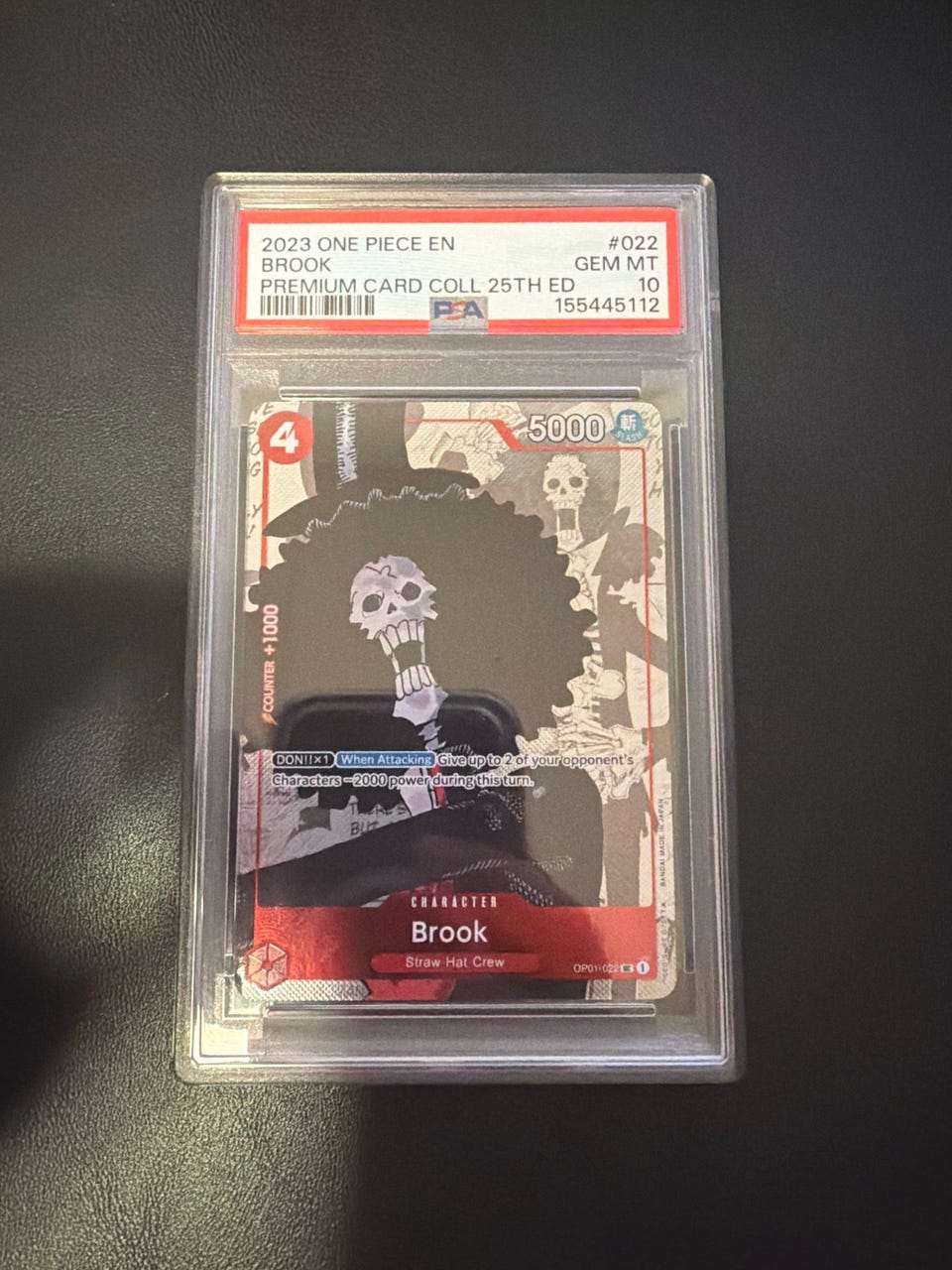 Brook OP01-022 PSA 10 – Premium Card Collection 25th Edition