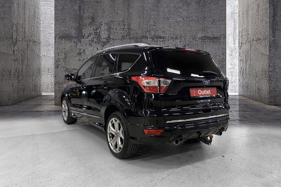 Kromlist bak, Vignale-emblem, stilige aluminiumsfelger, hengerfeste og sportsbumper bak