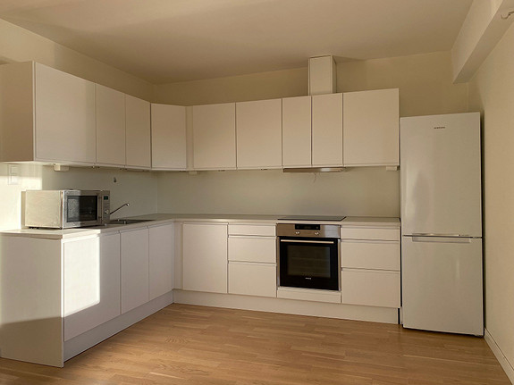 Velkommen til leilighet 302, her har du kjøkken med integrerte hvitevarer